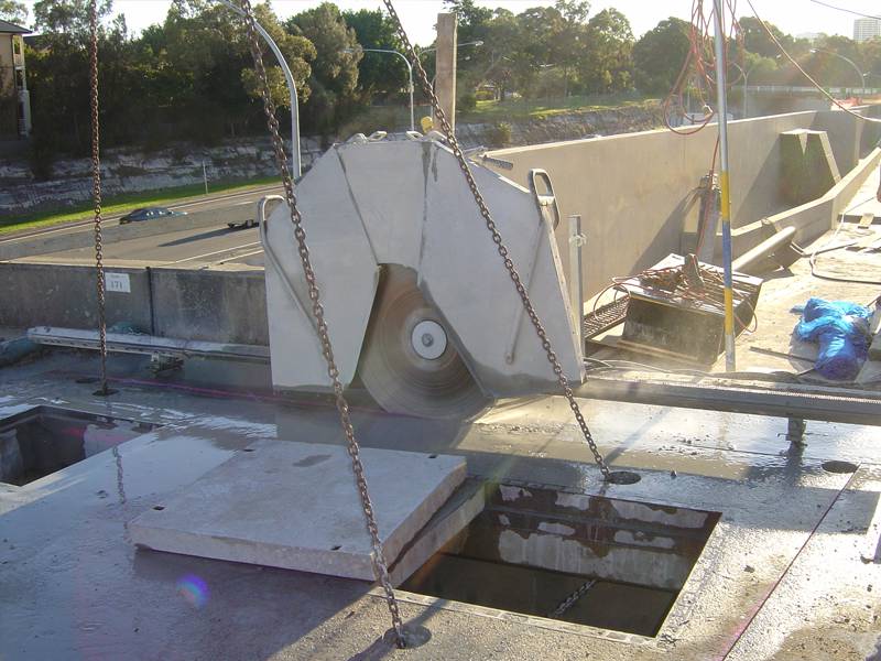 Block sawing a reinforced concrete electrical pit